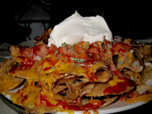 Potachos
Thick potato chips covered with chedder, bacon, tomatoes, onions, ketchup, chives and sour cream.
(submitted by Hannah via stuffyerface)